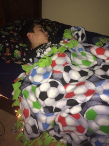 josh sleeping under blanket